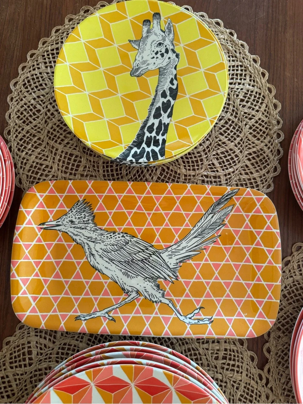 Set of 38 West Elm plates with colorful geometric prints & animal illustrations